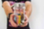 Man holding jar with money.